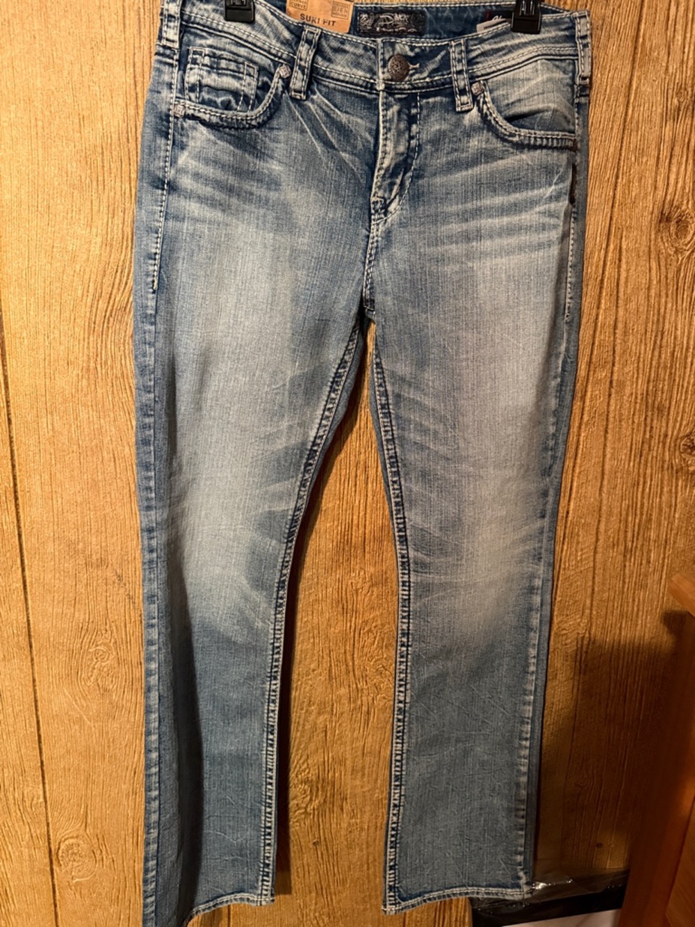 Silver Jeans Women's Faded Blue Boot Cut Jeans